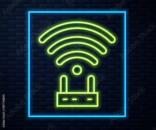 Glowing neon line Router and wi-fi signal icon isolated on brick wall background. Wireless ethernet modem router. Computer technology internet. Vector.