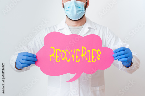 Text sign showing Recoveries. Business photo showcasing process of regaining possession or control of something lost Laboratory Technician Featuring Empty Sticker Paper Accessories Smartphone photo