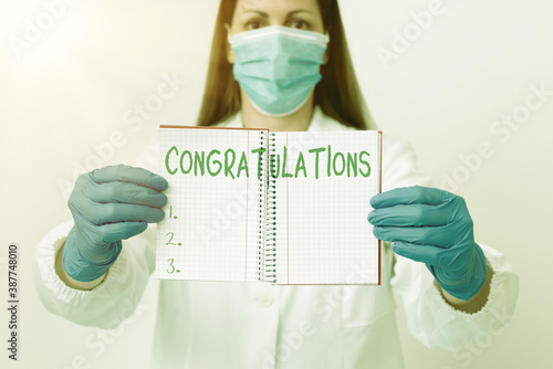 Word writing text Congratulations. Business photo showcasing a congratulatory expression usually used in plural form Laboratory technician featuring empty sticker paper accessories smartphone