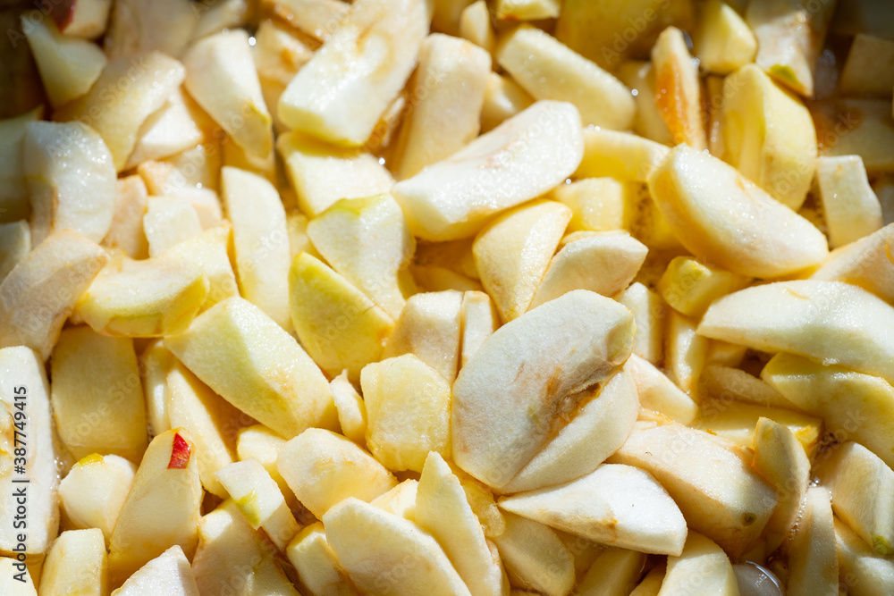 Making apple jam. Apples in sugar sand