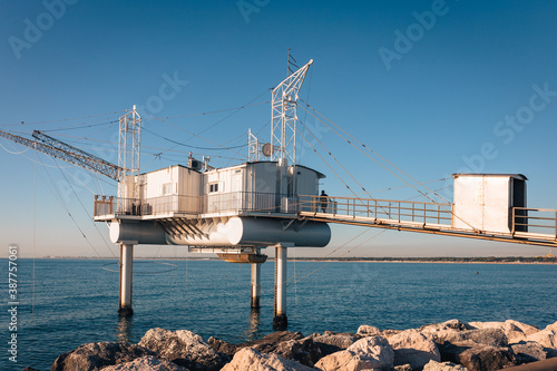 Marina di Ravenna, Ravenna / Italy - August 2020: Fishing huts of the Zaccagnini pier