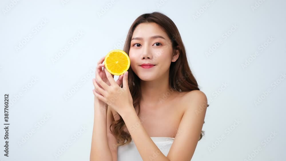 Portrait of beautiful asian woman looking to camera with attractive smile. People with beauty and skin care concept...woman smile and laugh joyfully on isolated white background.4K UHD. Portrait of beautiful asian woman looking to camera with attractive smile. People with beauty and skin care concept...woman smile and laugh joyfully on isolated white background.4K UHD.
