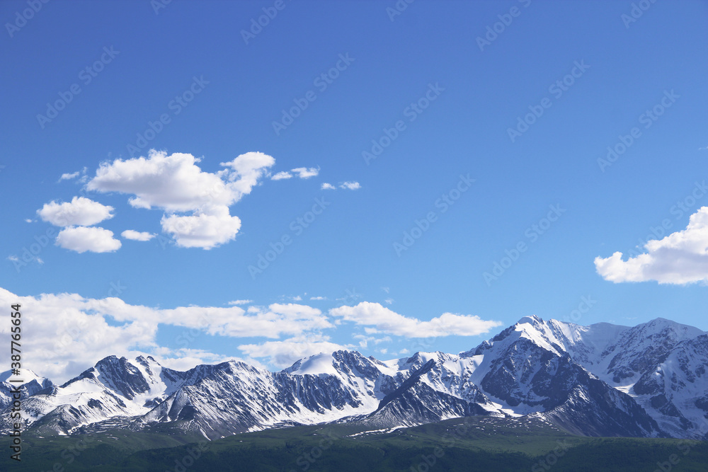 Snow-capped mountain range in the Altai steppe