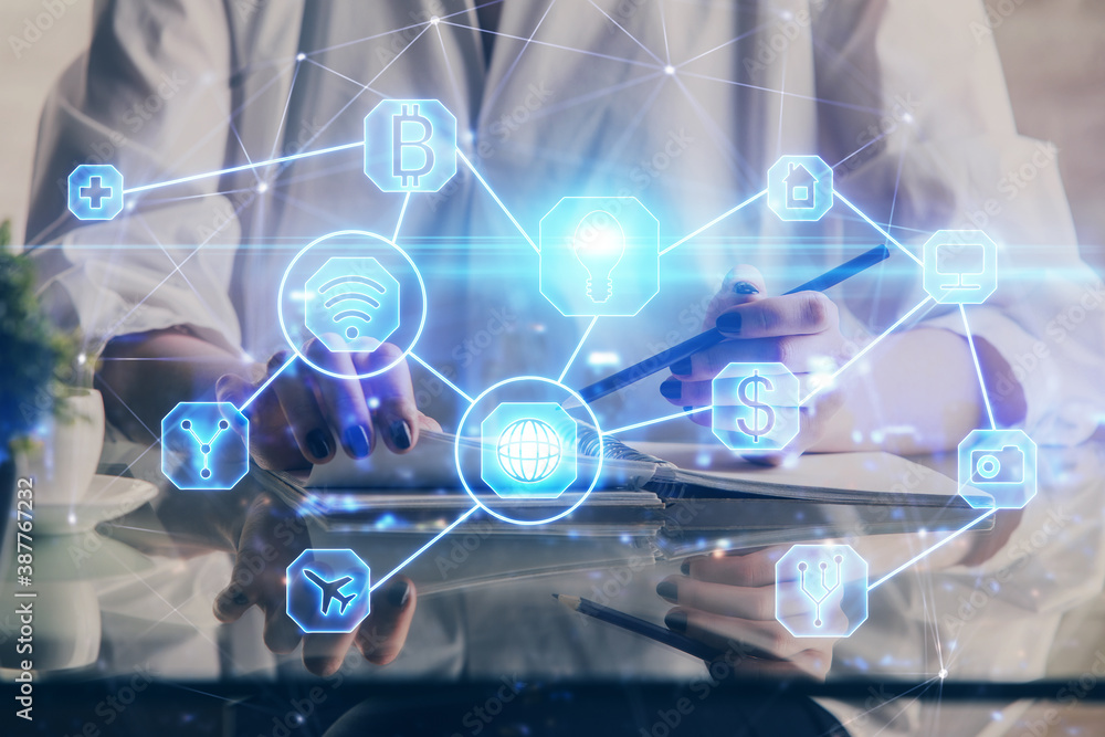 Social network theme hologram over woman's hands writing background. Concept of international people connect. Double exposure Social network theme hologram over woman's hands writing background. Concept of international people connect. Double exposure