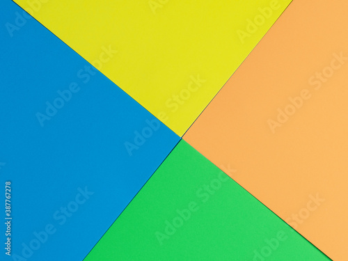 blue green yellow, orange paper background. Geometric figures, shapes. Abstract geometric flat composition