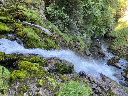 Giessbach Falls in the eponymous nature park and over Lake Brienz / Giessbachfälle (Giessbachfaelle) im gleichnamigen Naturpark und über dem Brienzersee - Canton of Bern, Switzerland (Schweiz) photo