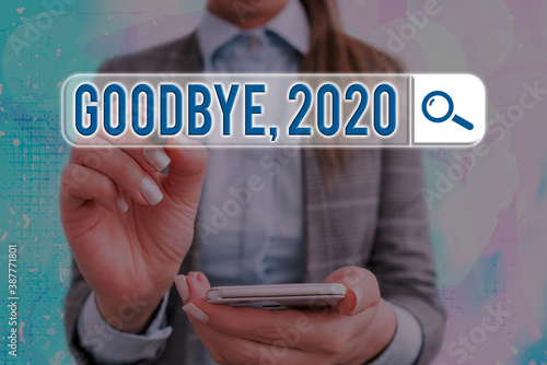 Conceptual hand writing showing Goodbye 2020. Concept meaning New Year Eve Milestone Last Month Celebration Transition Web search digital futuristic technology network connection photo