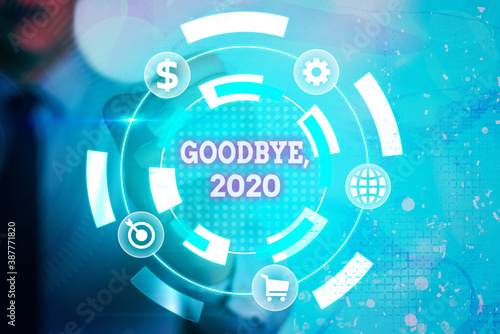 Writing note showing Goodbye 2020. Business concept for New Year Eve Milestone Last Month Celebration Transition Information digital technology network infographic elements photo