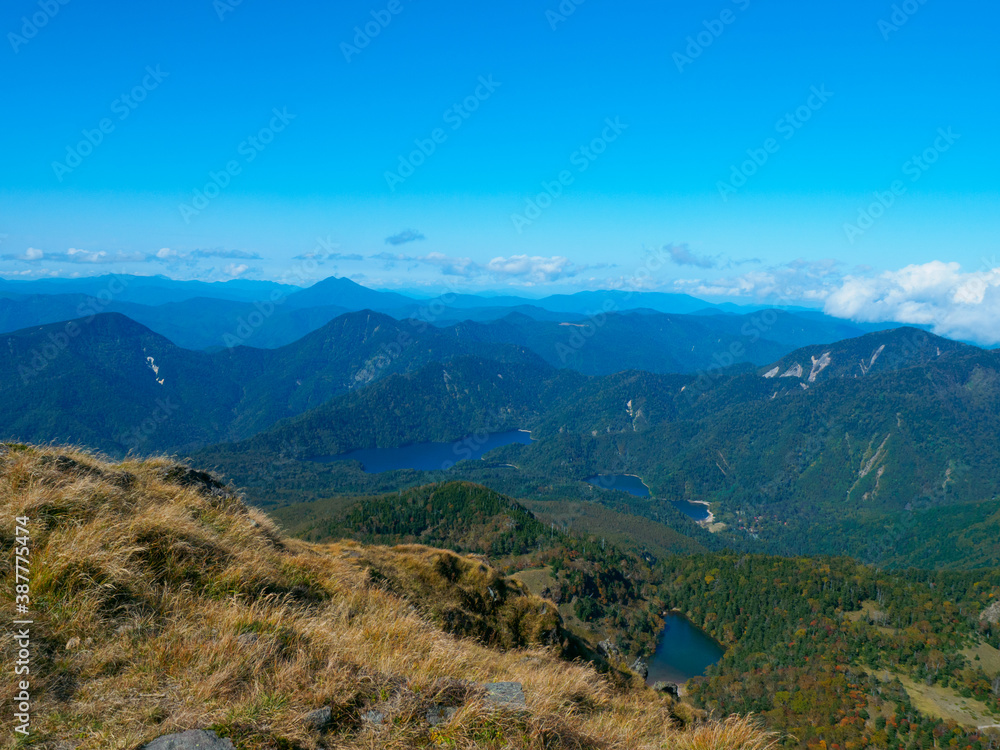 Fototapeta premium Ponds between autumnal mountains (Tochigi, Japan)
