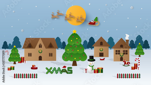 Santa claus on the sky coming city village with christmas tree in night time with snowfall. Christmas season and Happy new year season