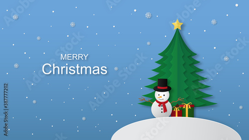 Snowman with christmas tree and golden star in winter snow. Christmas season and Happy new year season