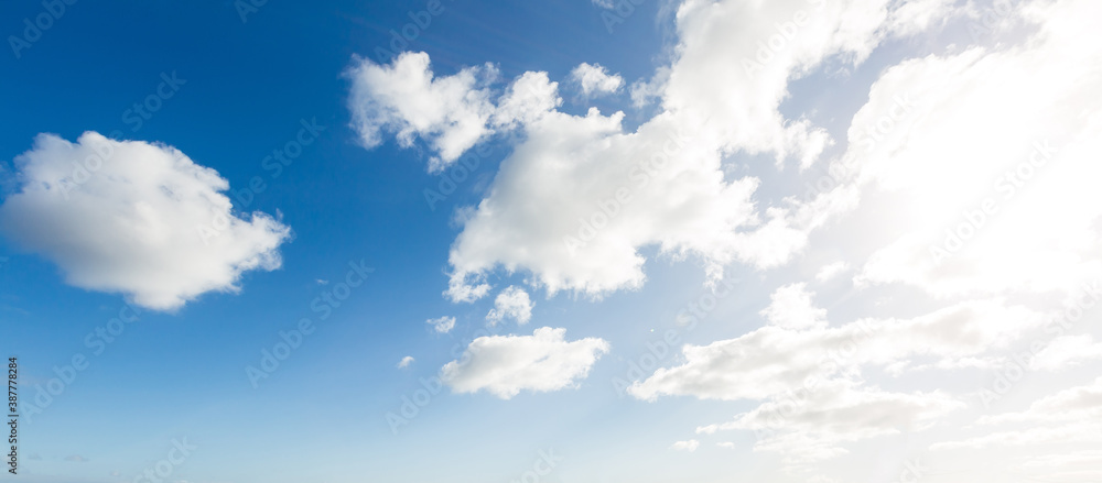 White, Fluffy Clouds In Blue Sky. Background From Clouds. White, Fluffy Clouds In Blue Sky. Background From Clouds.