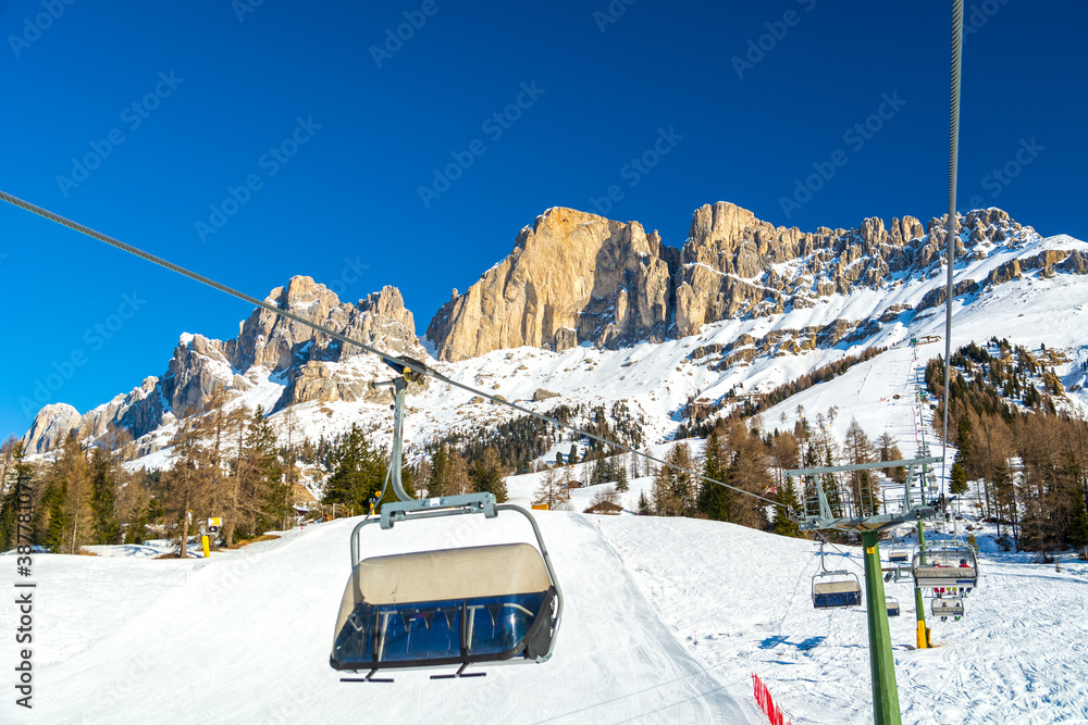 Ski lift and slope in Dolomites mountains, Italy Ski lift and slope in Dolomites mountains, Italy