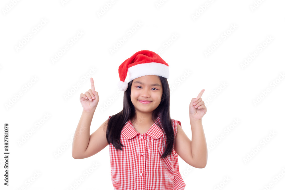 Asian girl wearing Santa hat Pointed to the side Asian girl wearing Santa hat Pointed to the side