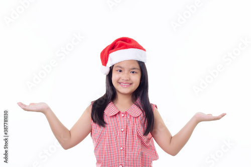 Portrait Little Asian girl wearing Santa hat
