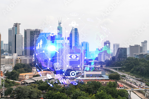 Research and development hologram over panorama city view of Kuala Lumpur. KL is hub of new technologies to optimize business in Malaysia, Asia. Concept of exceeding opportunities. Double exposure.