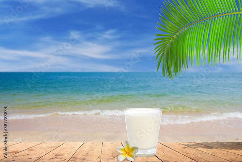 Fototapeta Naklejka Na Ścianę i Meble -  coconut cocktail on the beach