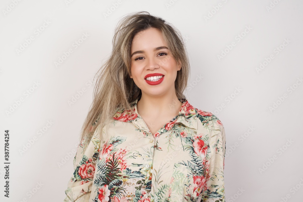 Beautiful smiling brunette female with broad smile, shows white teeth, rejoices having day off. Beautiful smiling brunette female with broad smile, shows white teeth, rejoices having day off.
