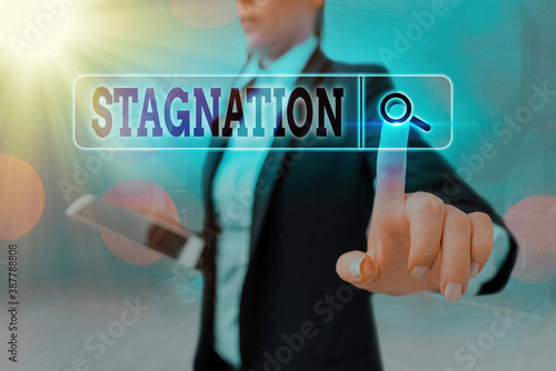 Conceptual hand writing showing Stagnation. Concept meaning condition marked by lack of flow, movement, or development Web search digital futuristic technology network connection