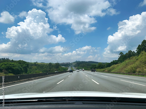 Point of view of a car on the Bandeirantes highway with São Paulo and Pico do Jaraguá in the background. photo