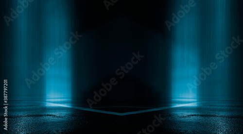Light effect, blurred background. Wet asphalt, night view of the city, neon reflections on the concrete floor. Night empty stage, studio. Dark abstract background, dark empty street. Night city. © MiaStendal