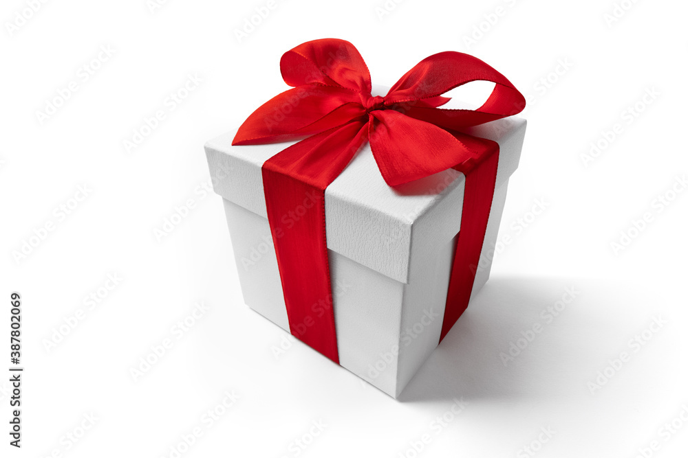 White gift box with red ribbon bow