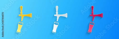 Paper cut Beer tap with glass icon isolated on blue background. Paper art style. Vector.