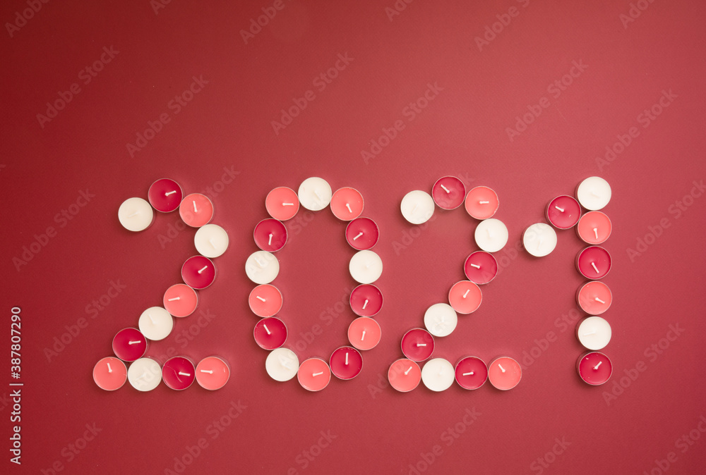 The number of the new 2021 is shown by candles on a red base. The number of the new 2021 is shown by candles on a red base.