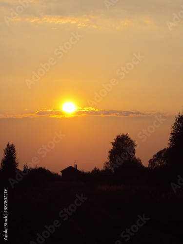 Sunset over the house