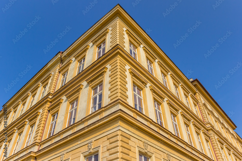 Yellow facade of a historic building in Litomerice, Czech Republic