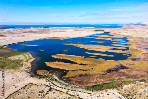 PAG ISLAND, CROATIA, OCTOBER 2020. Ornithological reserve Veliko blato on the island of Pag. Aerial panorama. It is a shelter for a wide variety of marsh birds.