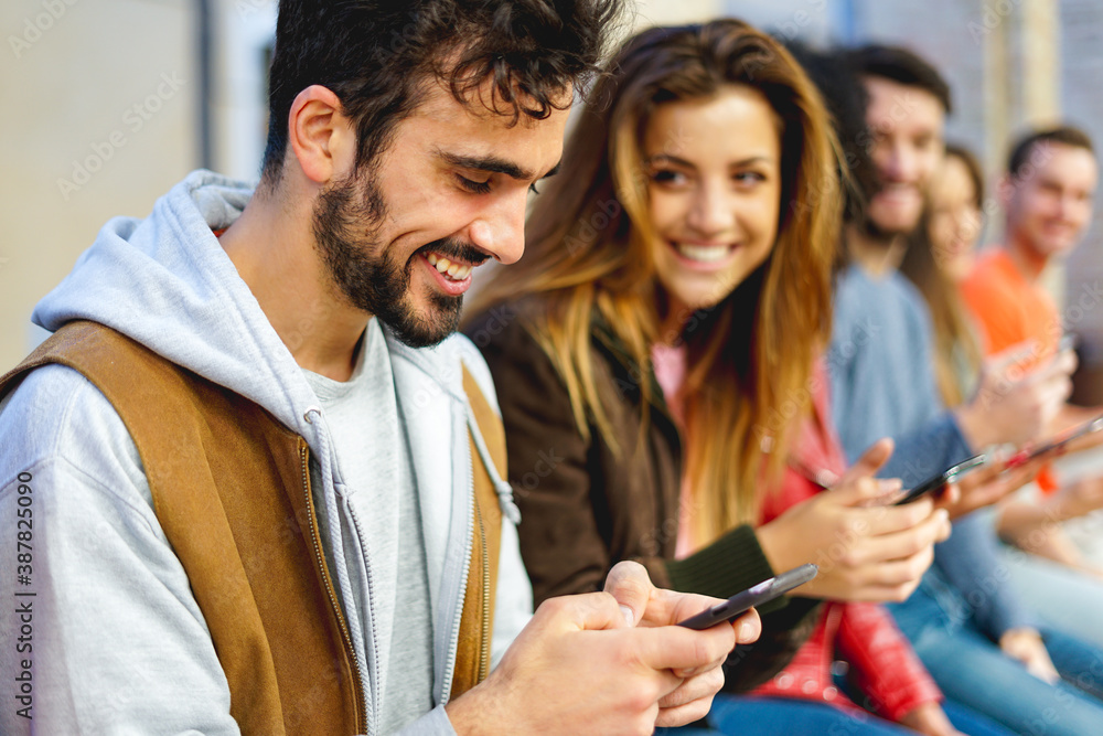 Cool man watching a funny video and having fun Cool man watching a funny video and having fun