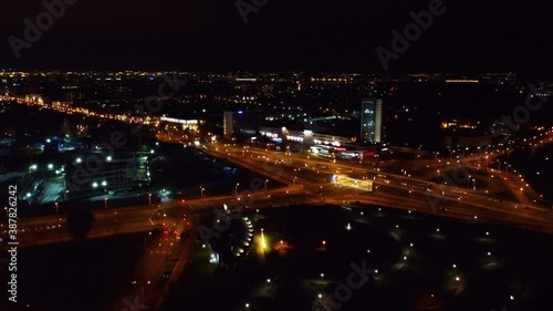 Nice view of the night highway with cars in the city