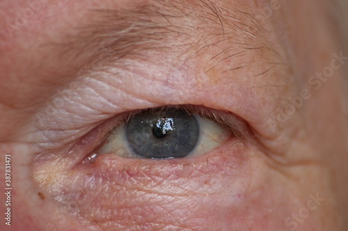 Close-up view of an elderly woman.