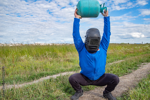 Ustye, Vologda Oblast, Russia July 20, 2020: Purposeful Person Athletic Person Outdoors Workout Outdoors Goal Achievement photo