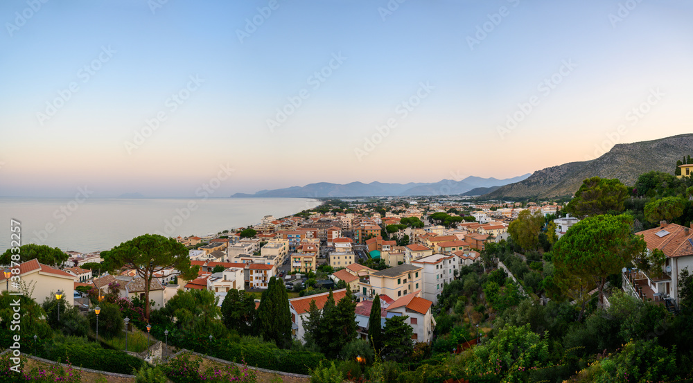 View on medieval small touristic coastal town Sperlonga and sea shore, Latina, Italy on sunrise