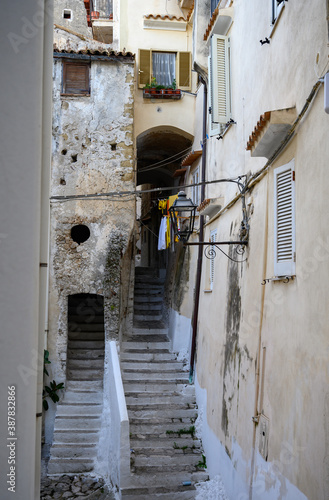 White stairs and old houses in medieval small touristic coastal town Sperlonga, Latina, Italy on sunrise © barmalini