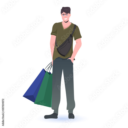 man holding shopping bags black friday big sale promotion discount concept full length vector illustration