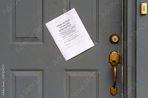 Eviction Final Notice to Vacate Immediately on House Door
