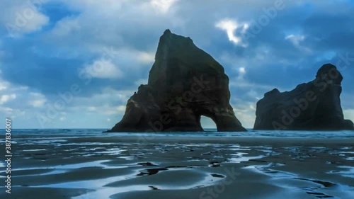 Mountain in the Iceland with frozen ice ocean in daytime with white clouds photo