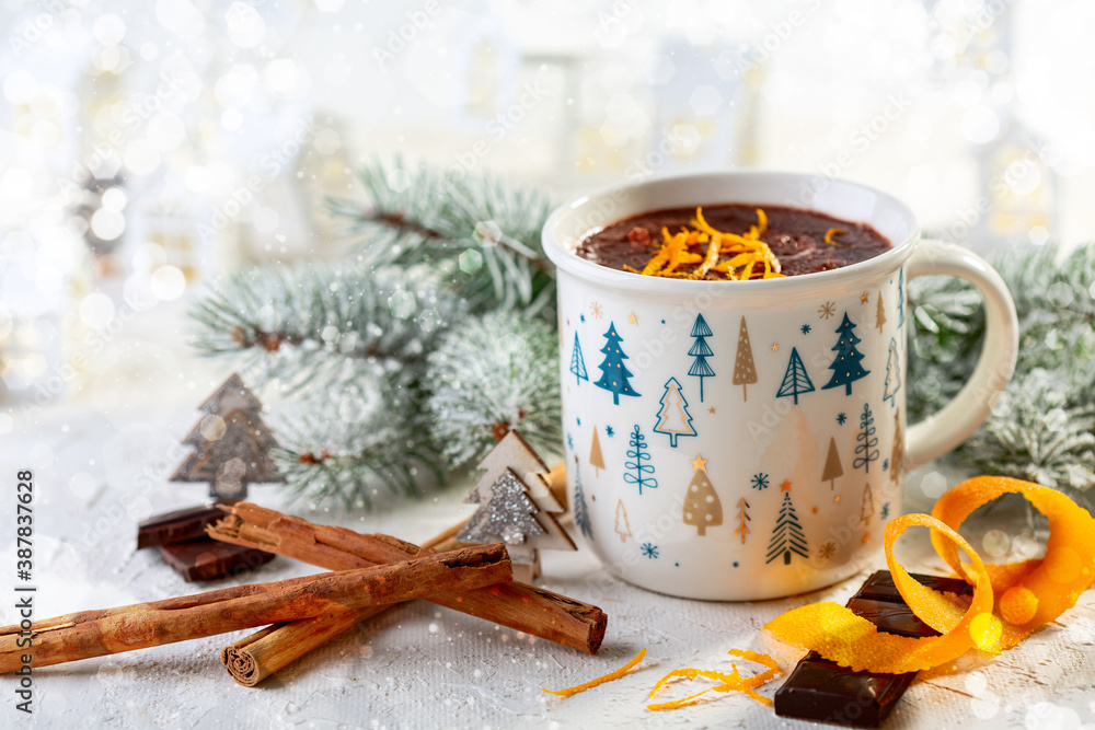 Mug of hot chocolate with cinnamon and orange zest. Mug of hot chocolate with cinnamon and orange zest.