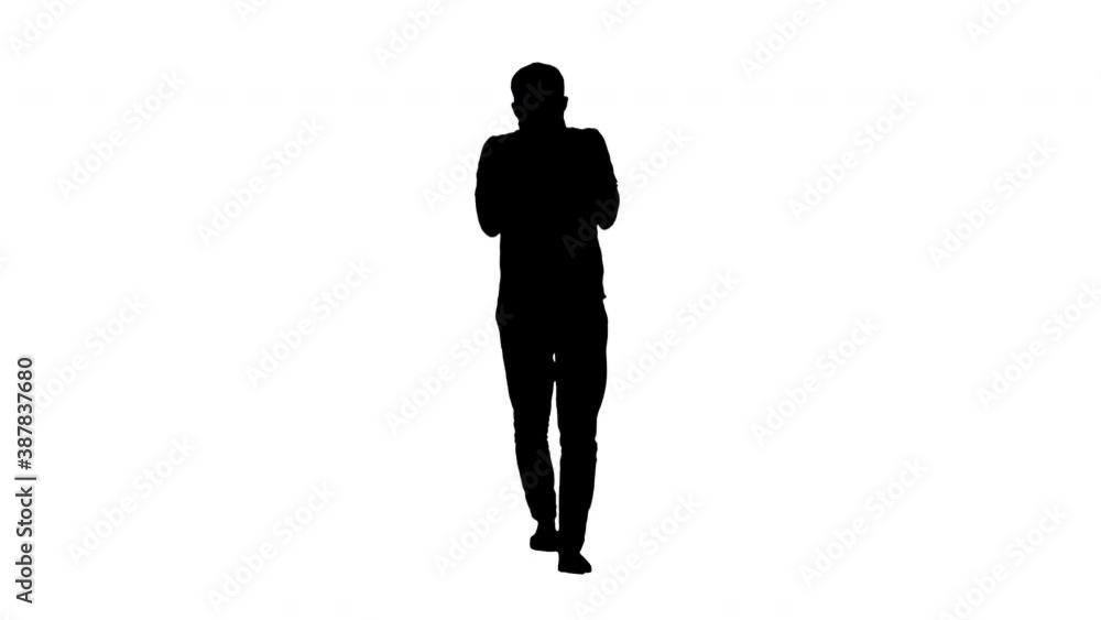 Silhouette Sleepy male in white t-shirt yawning and rubbing eyes while walking. Silhouette Sleepy male in white t-shirt yawning and rubbing eyes while walking.