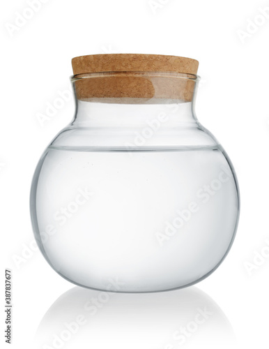 Round glass bottle with corc isolated.