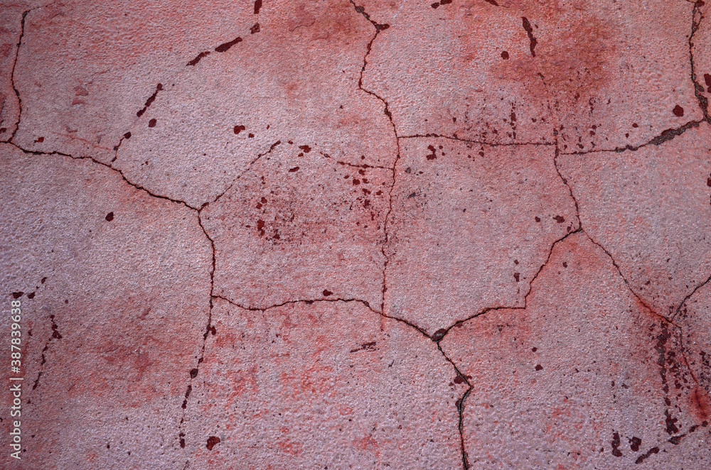 Pink wall. Cracks. Concrete texture. Background.