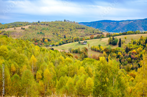 Colorful autumn landscape in the Romanian Carpathians  Fantanele village  Sibiu county  Cindrel mountains  1100m  Romania
