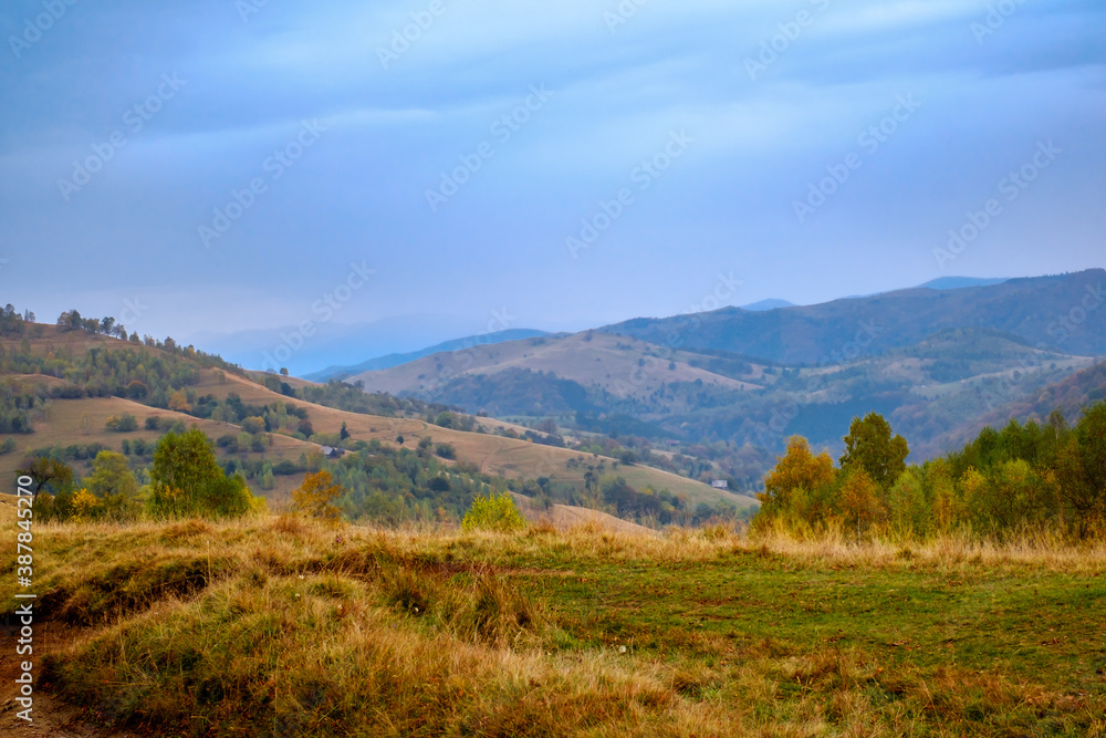 Colorful autumn landscape in the Romanian Carpathians, Fantanele village, Sibiu county, Cindrel mountains, 1100m, Romania Colorful autumn landscape in the Romanian Carpathians, Fantanele village, Sibiu county, Cindrel mountains, 1100m, Romania