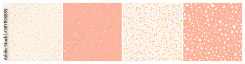 Set of pink, cream and mustard yellow terrazzo texture backgrounds. Seamless pastel patterns.