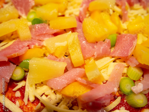Up Close On A Ham Pineapple Cheese Pizza