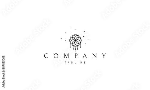 Vector logo in which an abstract image of a dreamcatcher on a background of stars.
