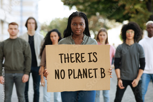 There is no planet B placard in african woman hands © Prostock-studio